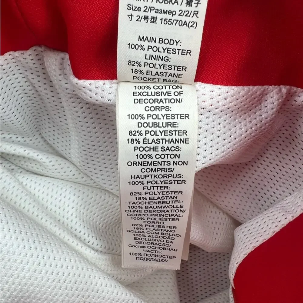 Tory Burch Sport Tech twill ruffled golf‎ skort red ruffle snap sz 2